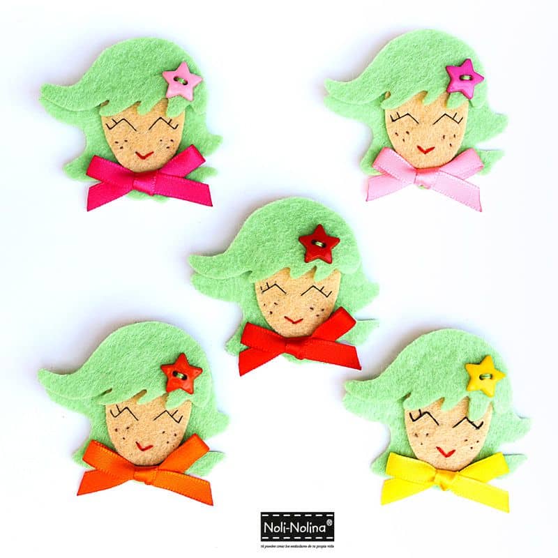 Broches de caritas de fieltro para obsequio de boda