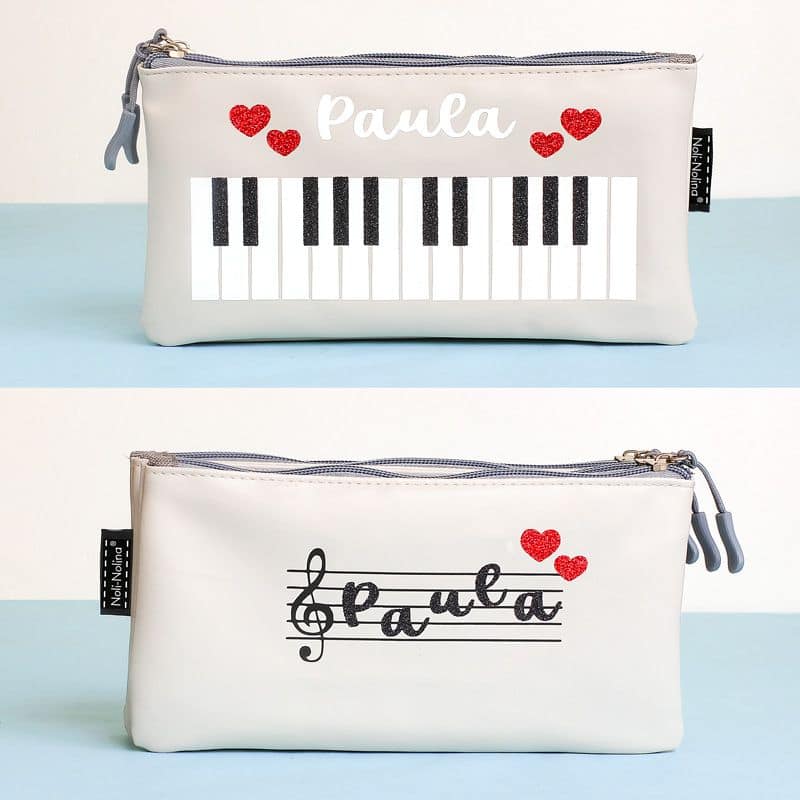 estuche de tres creamlleras con teclas de piano para Paula